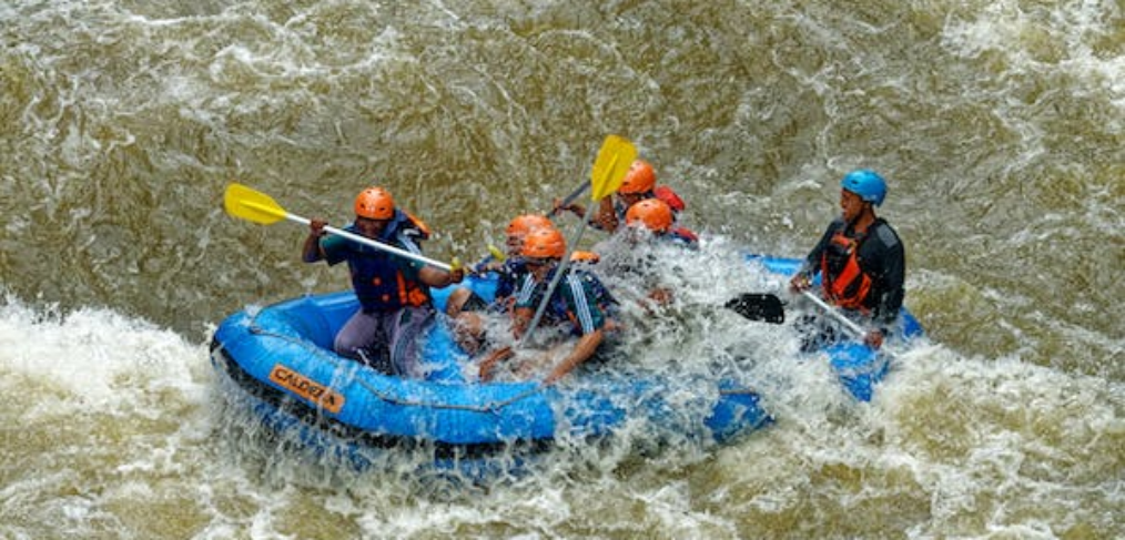 white water rafting group in rough water